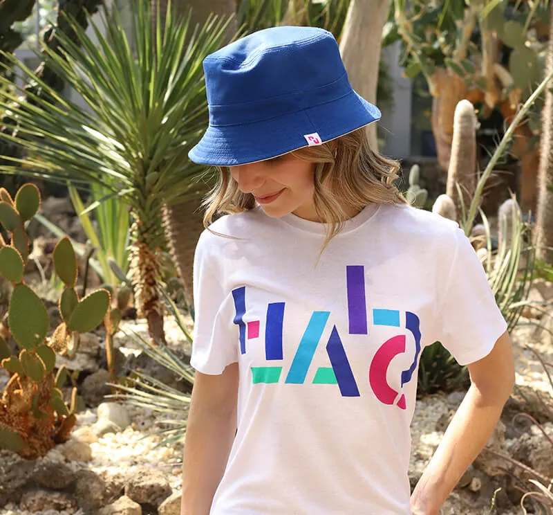 Young woman wearning HALO branded t-shirt and bucket hat