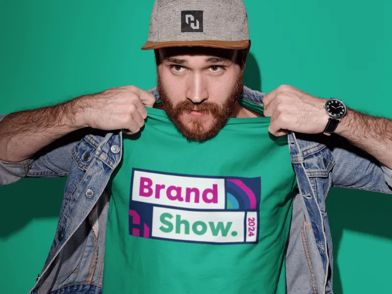 Man wearing trade show branded t-shirt and hat